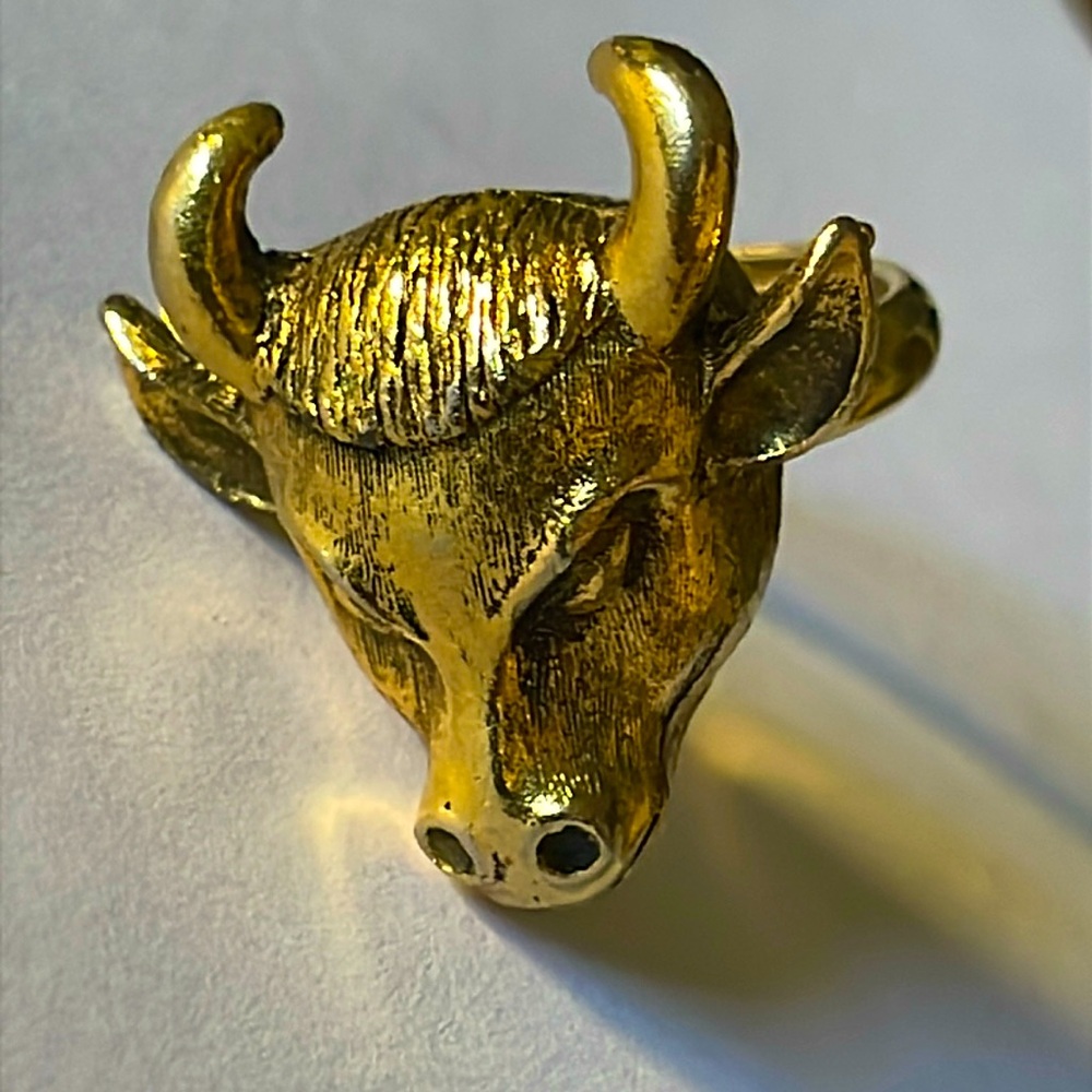 Gold bull head ring, signed Manselle